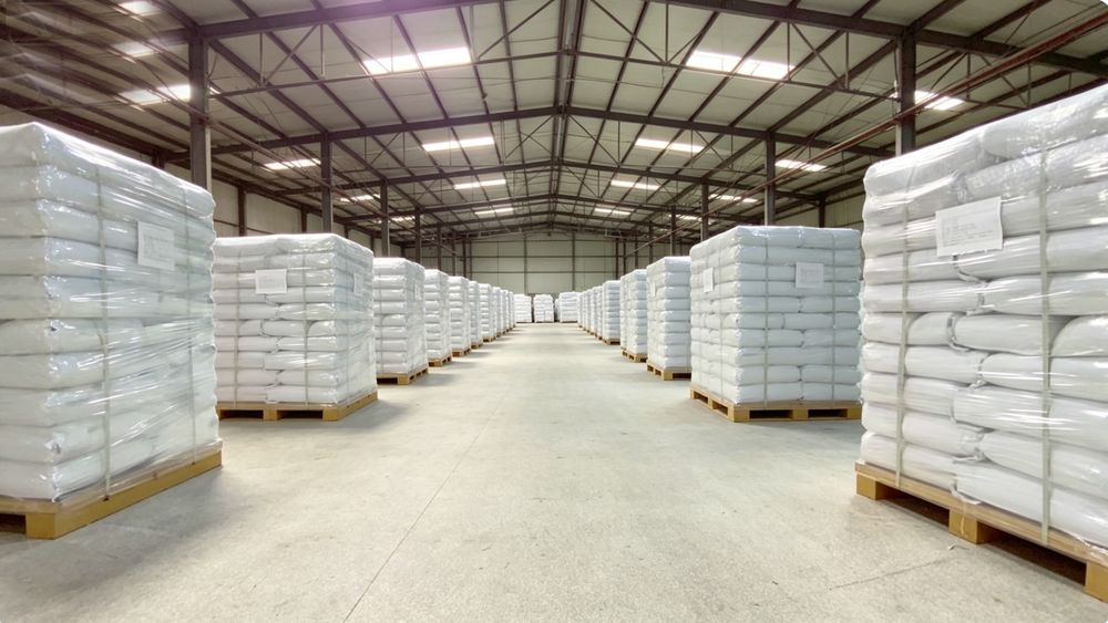 CP Organoclay finished goods warehouse — palletized 25kg organoclay bags ready for export
